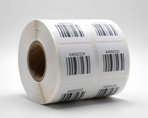 Rollo of white adhesive labels with bar code, white background, high quality (1)